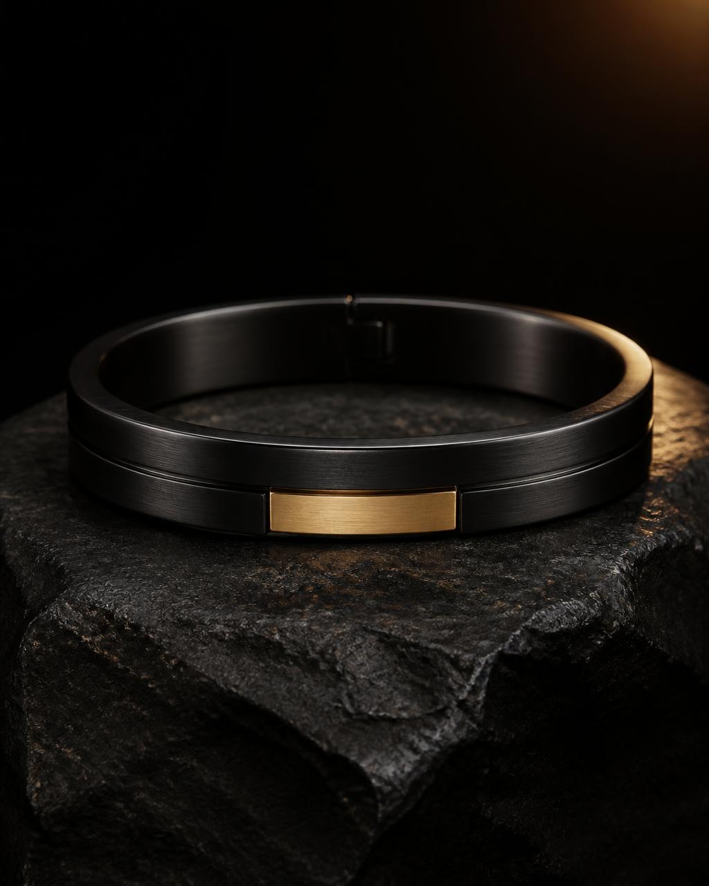 Black and gold Panther Signature kada on a neutral surface